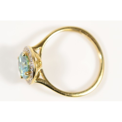 663 - A 9ct gold synthetic moisssanite and white gemstone halo ring, P 1/2, 2.5g