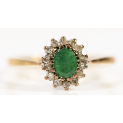 669 - A 9ct gold vintage emerald and diamond cluster ring, K 1/2, 1.5g