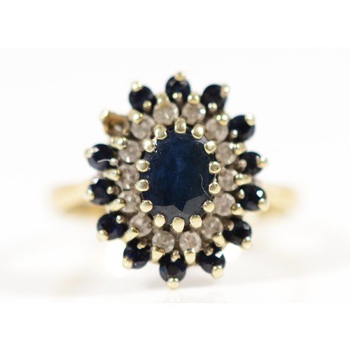 673 - A 9ct gold vintage sapphire and diamond dress ring, M, 3.5g