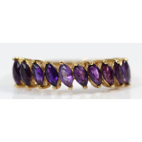 676 - A 9ct gold marquise cut amethyst half eternity ring, T, 2.8g