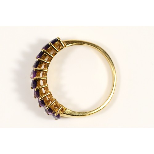 676 - A 9ct gold marquise cut amethyst half eternity ring, T, 2.8g