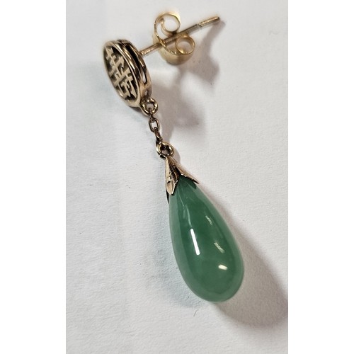 594 - A pair of 9ct gold jade drop earrings with Chinese symbols to the top, 30mm total drop, 3.6g