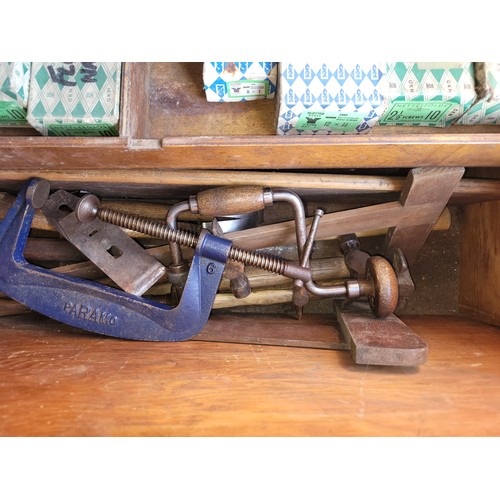 54 - A large toolbox containing a collection of carpenters hand tools.