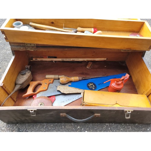 55 - A toolbox containing a collection of carpenters hand tools.