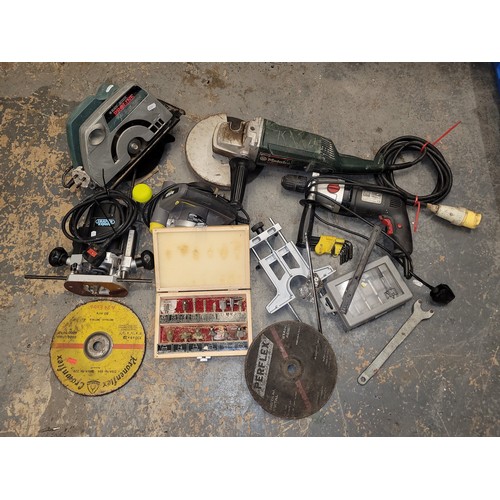 88 - An assortment of power tools, to include, a Metabo nine inch angle grinder, a ripsaw, a 100V challen... 