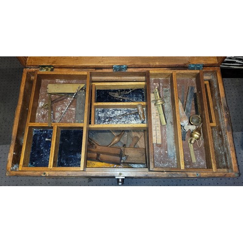 100 - A large wooden tool box, containing an assortment of wares,  including a boxwood ruler.