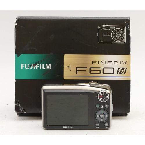 A Fujifilm Finepix F60 digital camera, serial number 8DQ09679