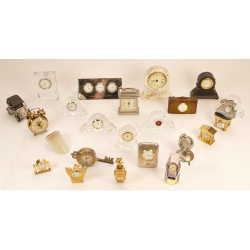 A Collection of 22 Miniature Brass Novelty Quartz Clocks