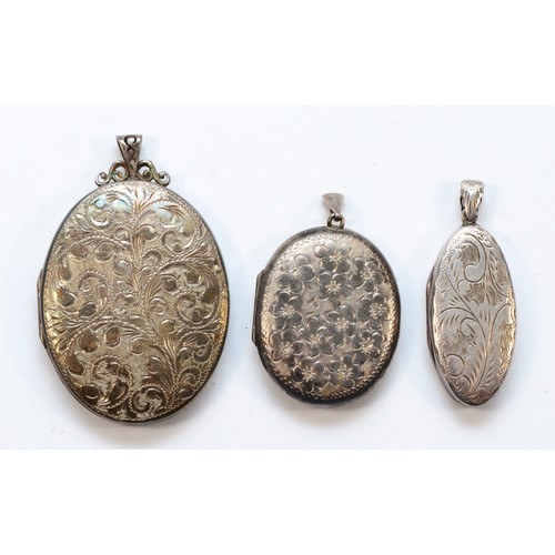 1181 - Three silver lockets, the largest 52 x 40mm, 45gm