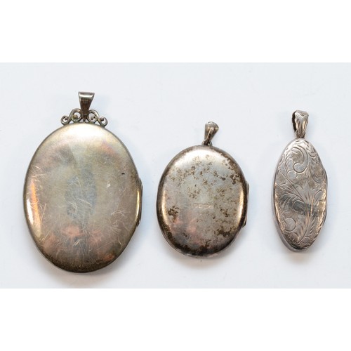 1181 - Three silver lockets, the largest 52 x 40mm, 45gm