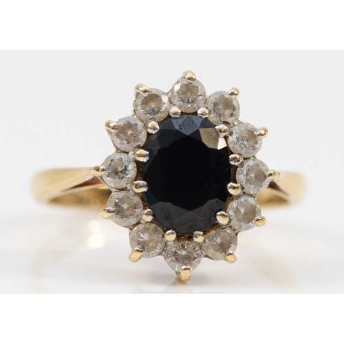 1317 - A 9ct gold sapphire and white stone cluster ring, M, 3.1gm