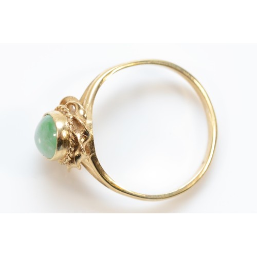 1322 - An unmarked 9ct gold and Jadeite ring, O, 2.3gm