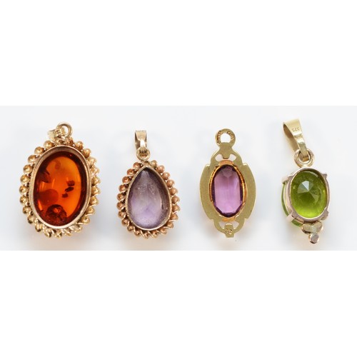 1274 - A 9ct gold amber mounted pendant, 13 x 8mm, two amethyst pendants and a green stone pendant, 5.2gm