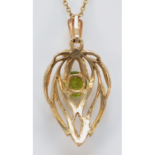 1493 - A 9ct gold green gemstone pendant with chain, 20mm pendant length, 2.8g