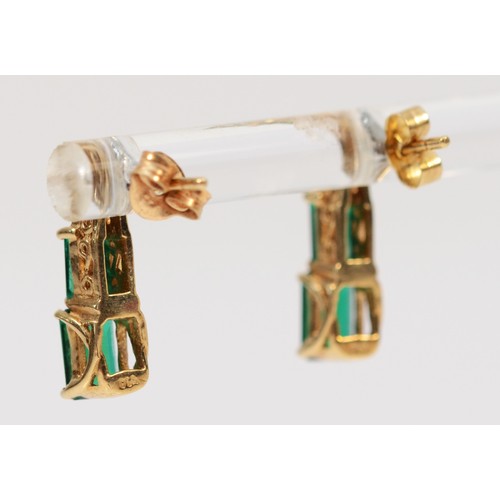 1499 - A pair of 9ct gold green gemstone and diamond graduated drop earrings with scroll backs, 15mm drop, ... 