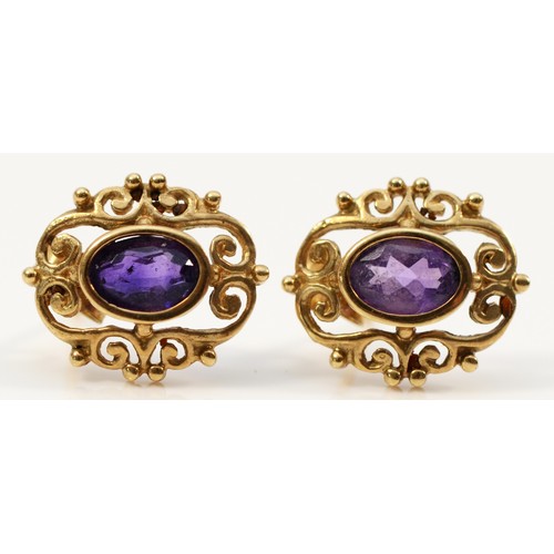 1503 - A pair of 9ct gold amethyst stud earrings, 12mm length, 1.3g