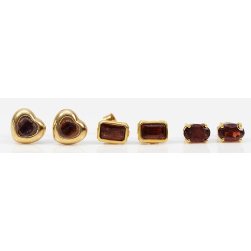 1505 - Three pairs of 9ct gold amethyst and garnet stud earrings, 2.3g