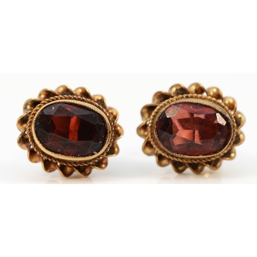 1506 - A pair of 9ct gold garnet stud earrings, 10mm length, 2g