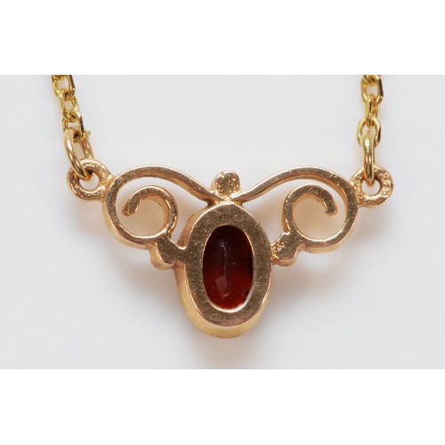 1523 - A 9ct gold vintage garnet necklace, 13mm front, 2.2g