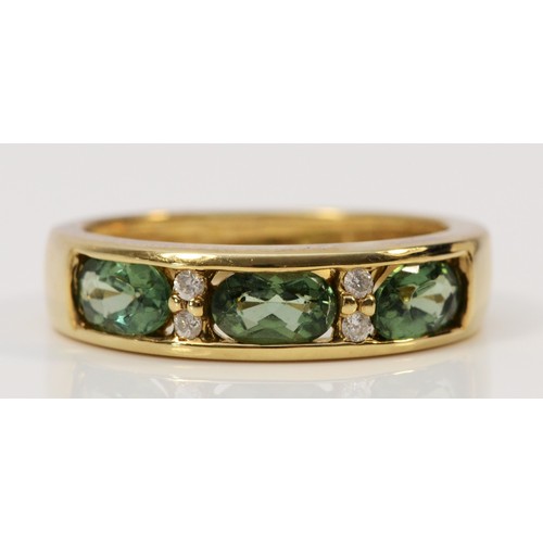 1361 - A 9ct gold QVC green stone and brilliant cut diamond ring, P, 2.9gm