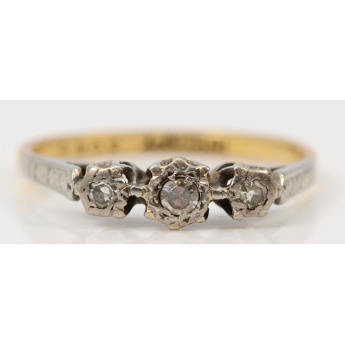 1290 - A 9ct gold and platinum diamond three stone ring, M 1/2, 1.9g