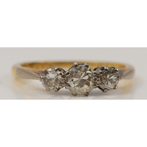 1373 - An 18ct gold and platinum old cut brilliant diamond three stone ring, approximately 0.45cts, H/I, VS... 