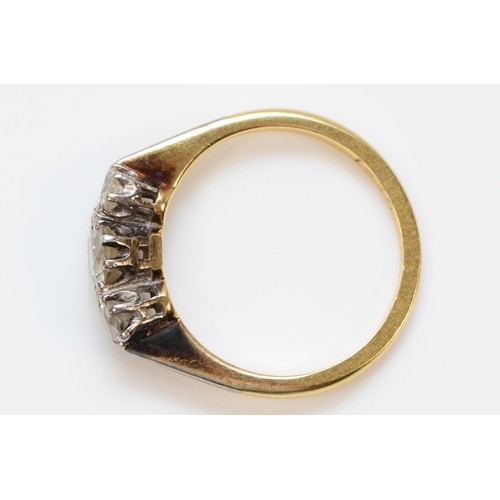 1373 - An 18ct gold and platinum old cut brilliant diamond three stone ring, approximately 0.45cts, H/I, VS... 