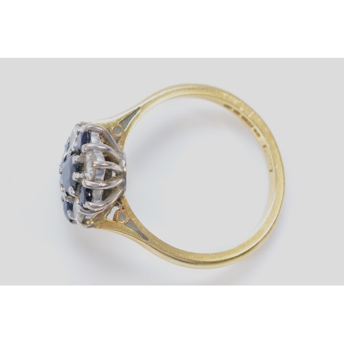 1374 - An 18ct gold sapphire and brilliant cut diamond cluster ring, London 1970, M, 4.2gm