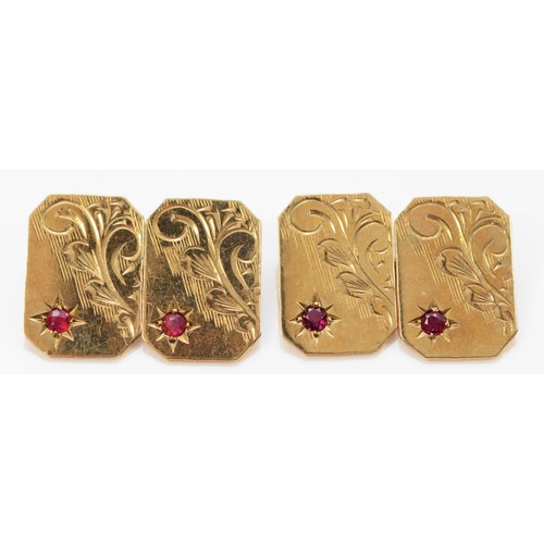 1402 - A pair of 9ct rose gold and ruby cufflinks, Birmingham 1979, 6.8gm