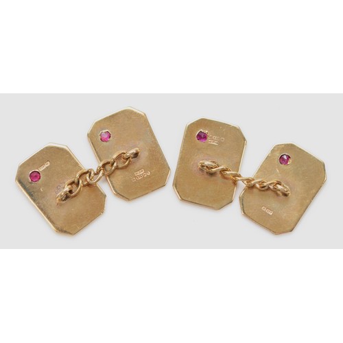 1402 - A pair of 9ct rose gold and ruby cufflinks, Birmingham 1979, 6.8gm