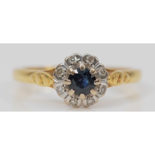 1416 - An 18ct gold sapphire and diamond cluster ring, P, 4gm