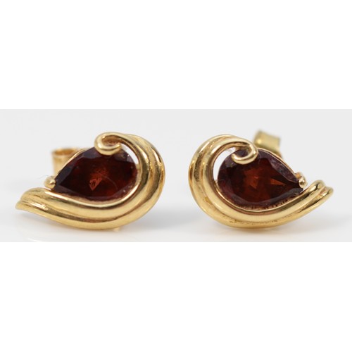 1380 - A pair of 9ct gold pear cut garnet earrings with scroll backs, together with a matching pendant, 15m... 