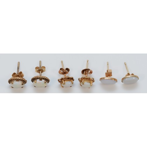 1383 - Three pairs of 9ct gold opal stud earrings with scroll backs, 2.9g