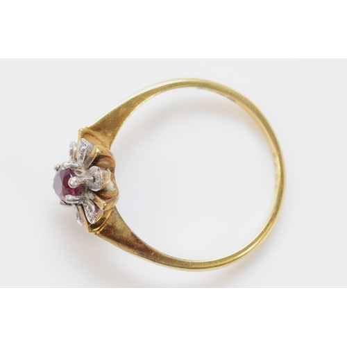 1386 - An 18ct gold vintage ruby and diamond floral burst cluster ring, O 1/2, 3.4g