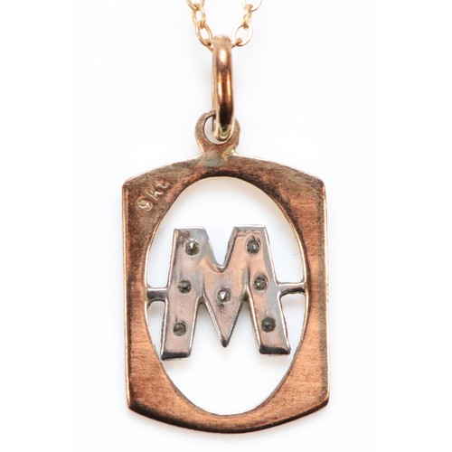 1421 - A 9ct gold diamond initial M pendant with 9ct gold chain, 16mm x 12mm pendant, 1.8g