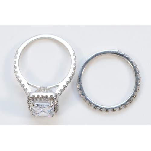 1460 - A 14K white gold and white stone dress ring and a 14K white gold half ET ring, both N1/2, 5.5gm