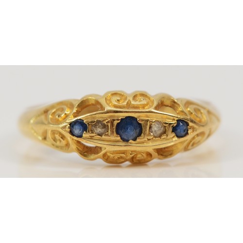 1425 - An 18ct gold vintage sapphire and diamond five stone dress ring with ornate gallery, R, 3.2g