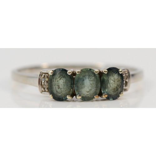 1430 - A 9ct gold green sapphire and diamond three stone ring, R 1/2, 2g