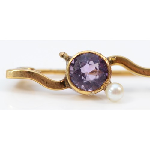 1236 - A 9ct rose gold antique amethyst and seed pearl brooch, 45mm across, 1.8g