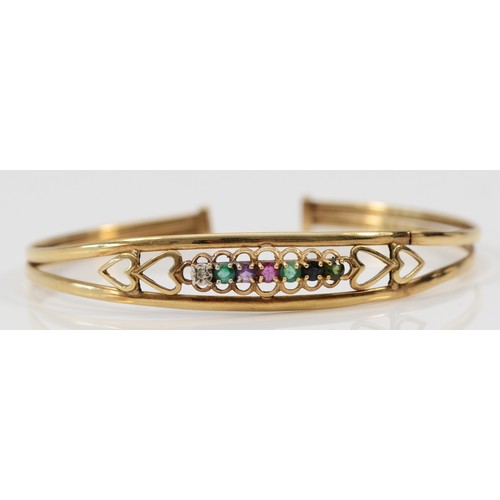 1239 - A 9ct gold Dearest taupe bangle, gemstones include diamond, emerald, amethyst, ruby, sapphire and to... 