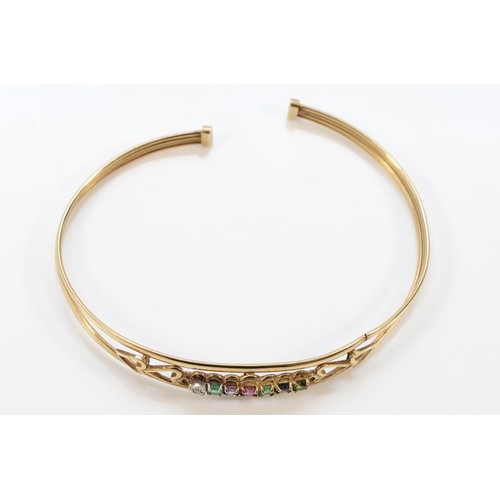 1239 - A 9ct gold Dearest taupe bangle, gemstones include diamond, emerald, amethyst, ruby, sapphire and to... 