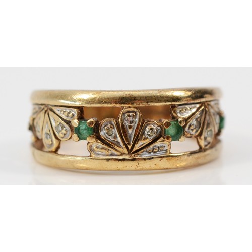 1240 - A 9ct gold emerald and diamond floral dress ring, L 1/2, 3g