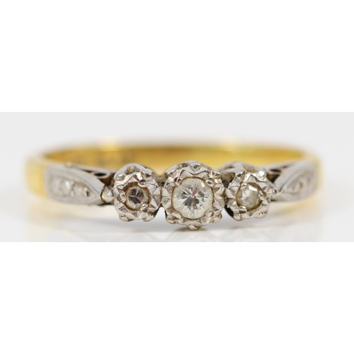 1592 - An 18ct gold diamond three stone ring, L, 2.5g