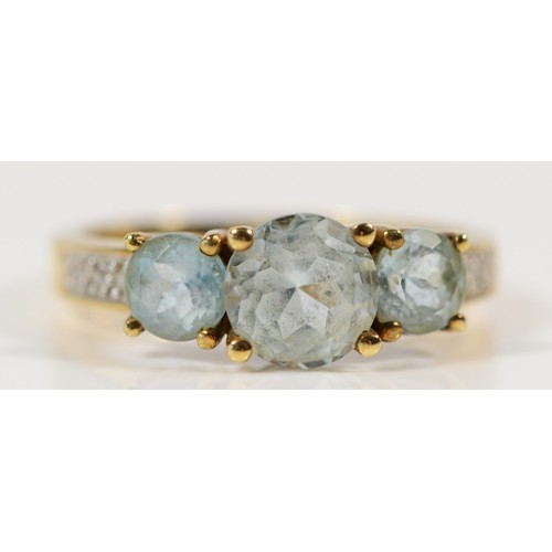 1627 - A 9ct gold blue topaz and diamond dress ring, Q, 3.4g