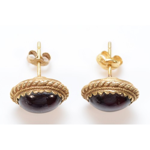 1301 - A pair of 9ct gold cabochon cut garnet stud earrings, 13mm length, 3.7g