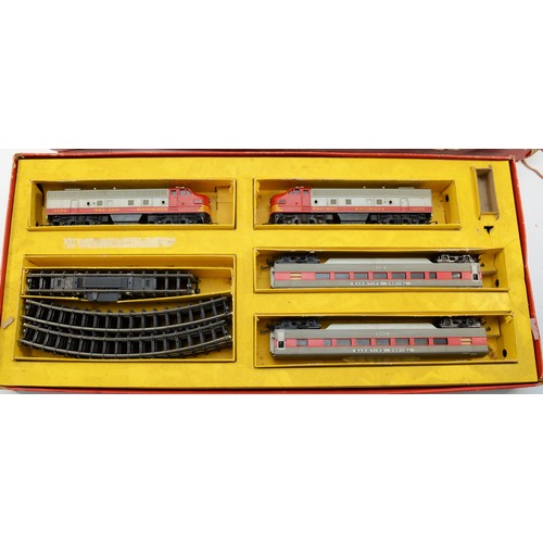11 - Model Railway 00 gauge; comprising Hornby Dublo train set, boxed and a Tri-Ang train set R3.H, boxed... 