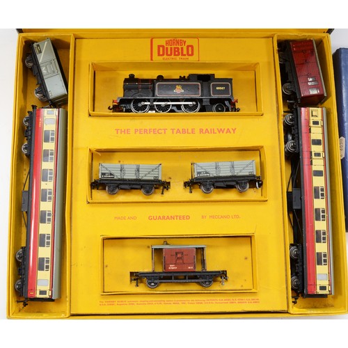 13 - Hornby Railways; comprising Dublo train set B.R class 69567 engine, two carriages and five goods wag... 