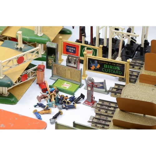 23 - Hornby 00 Gauge Railways; Comprising Dublo model buildings and accessories, to include boxed girder ... 