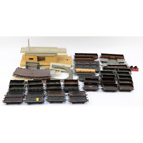 24 - Hornby 00 Gauge Railways; A large collection of over sixty five Dublo unboxed model railway rolling ... 