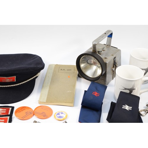 36 - An assortment of railway equipment, to include a British Rail peaked hat, a Bardic signaling lamp, t... 